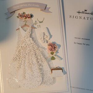 FREE premium $10 Hallmark wedding card Here Comes the Bride with purchase  $65